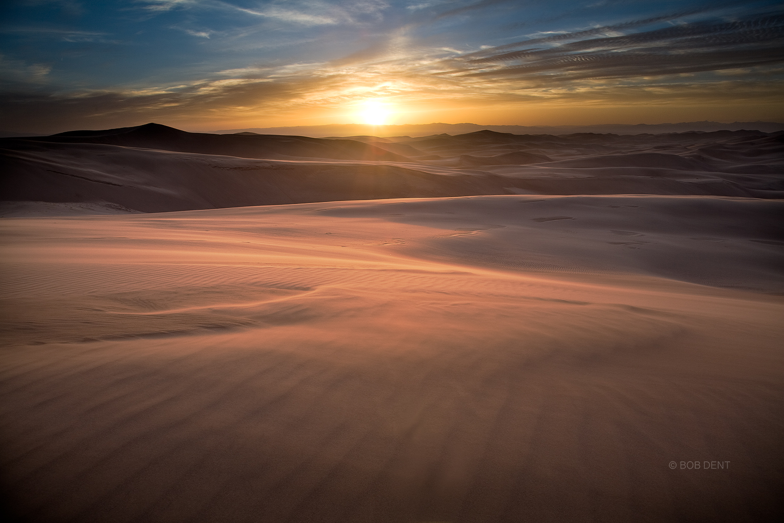 The sun sets over the sand dunes, Great Sand Dunes National Park and Preserve, Colorado.