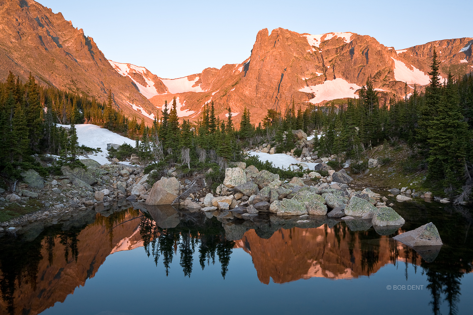 Notchtop Mountain reflecting in a small tarn, Rocky Mountain National Park, Colorado.