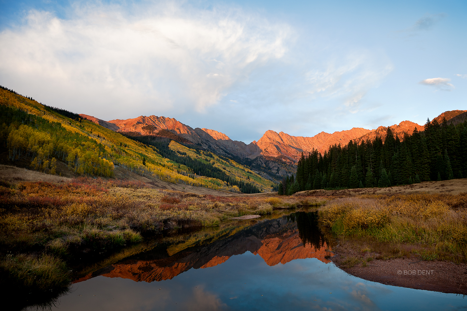 Alpenglow lights up the Gore Range above Piney River, White River National Forest, Colorado.