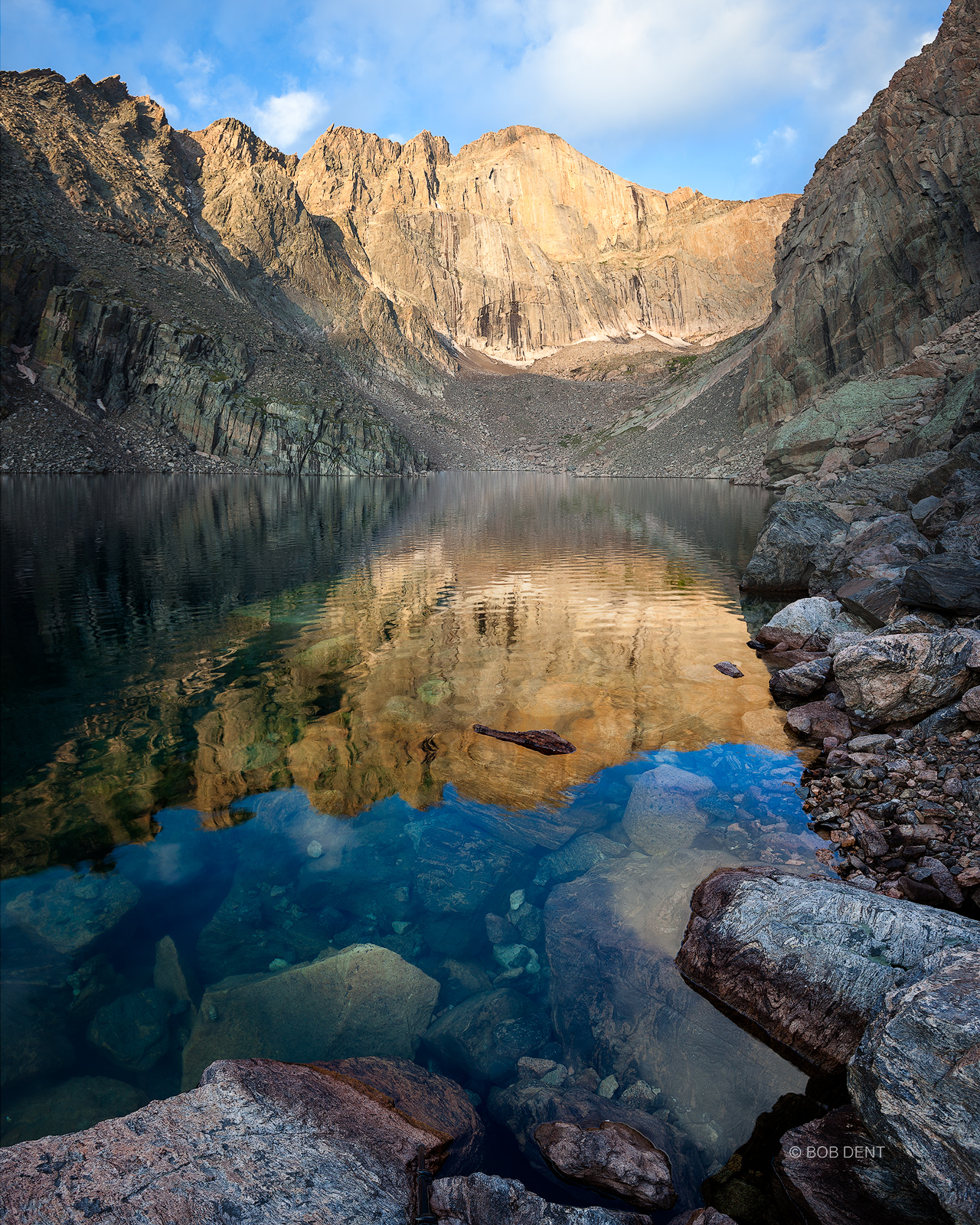 The East face of Longs Peak reflecting in Chasm Lake.