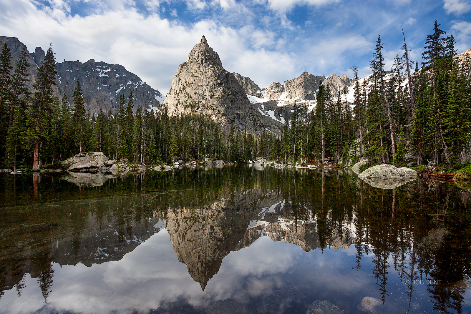 Mirror Lake Morning Morning light shines on Lone Eagle peak.